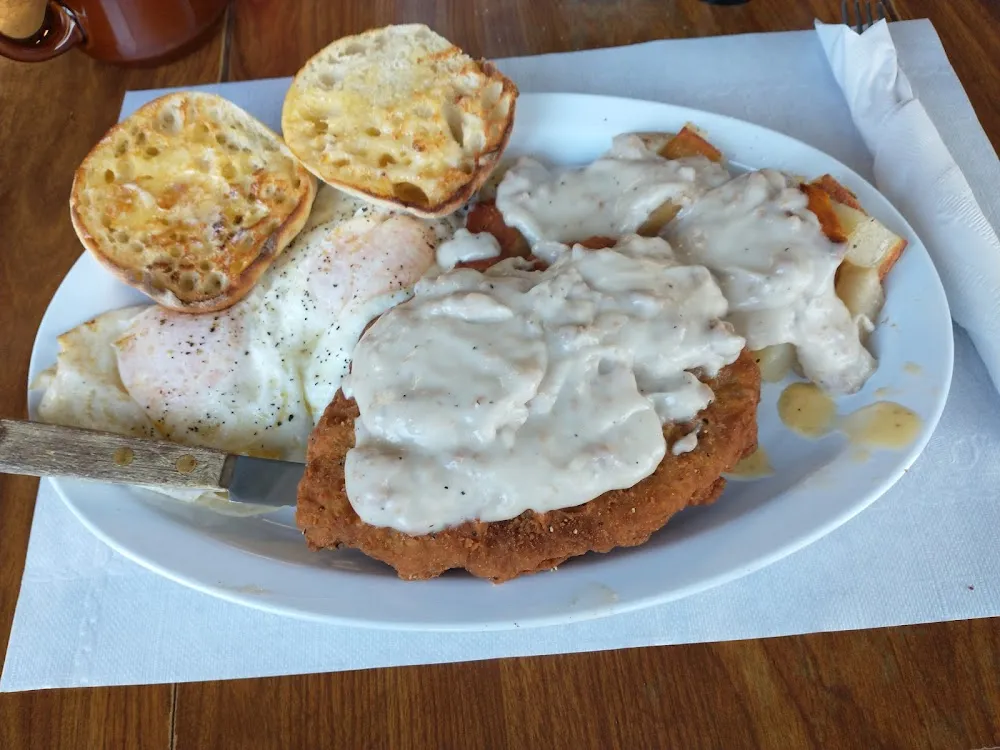 Country Fried Steak and Eggs Any Style and Hash Browns